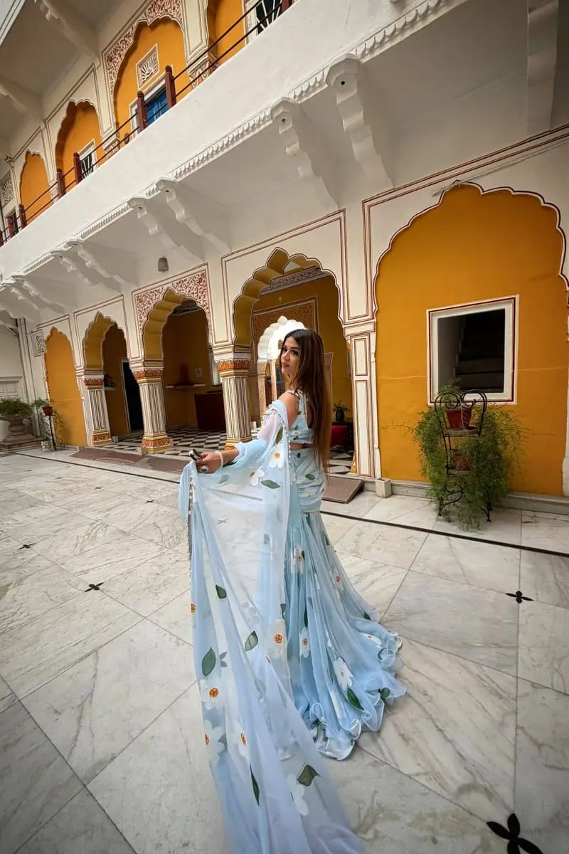 Elegant Sky Blue Floral Organza Saree with Designer Blouse & Soft Flowy Drape