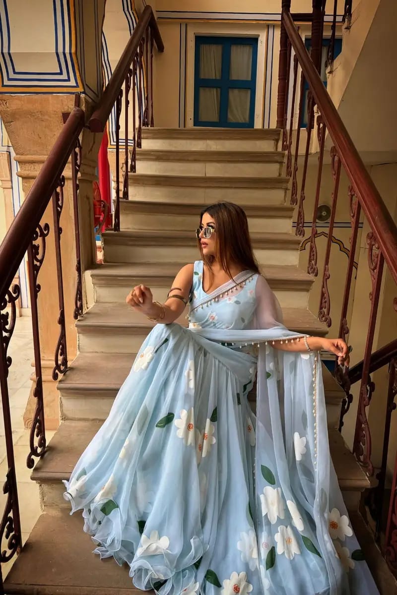 Elegant Sky Blue Floral Organza Saree with Designer Blouse & Soft Flowy Drape